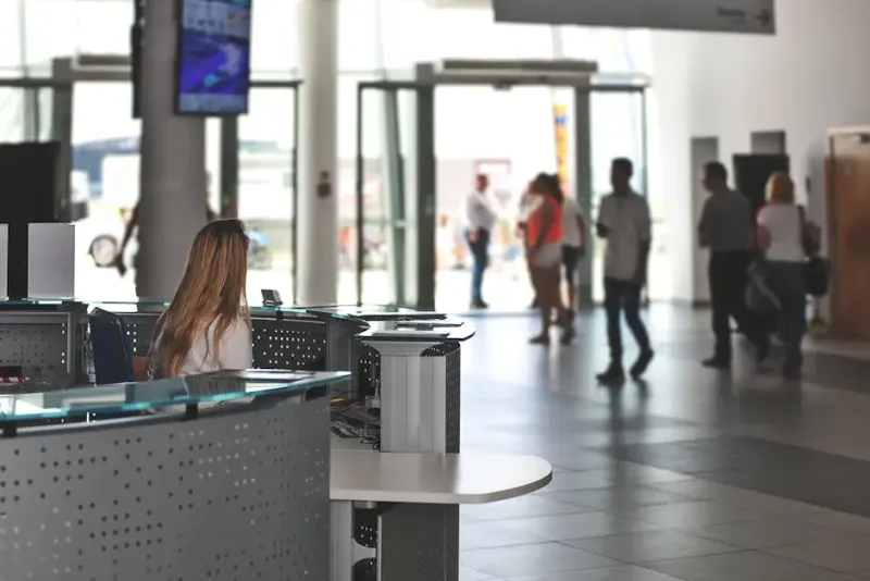 White Sitting Behind Counter Under Television